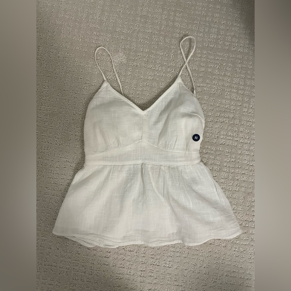 White tie back peplum tank